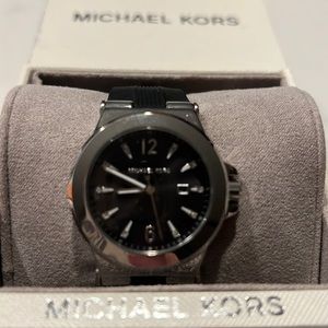 NWT MICHAEL KORS Women’s black dial w/date,silicone band silver accents.BNWT